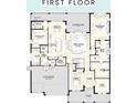 First floor layout featuring open-concept living spaces and Primary suite at 4208 W Vasconia St, Tampa, FL 33629