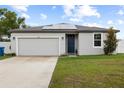 Charming single-Gathering home boasting a well-manicured lawn and solar panels for energy efficiency at 11123 Thornberry Dr, Spring Hill, FL 34609