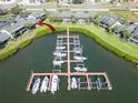 Gorgeous waterfront condos with private boat dock and well-manicured lawns create a serene living environment at 644 Yardarm Dr # 22, Apollo Beach, FL 33572