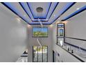Elegant foyer boasting soaring ceilings, a modern chandelier, and an abundance of natural light at 6520 Simone Shores Cir, Apollo Beach, FL 33572