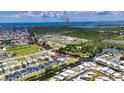 Aerial view showcases the waterfront property and its location near the Gulf at 6526 Simone Shores Cir, Apollo Beach, FL 33572