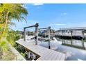 View of a boat lift on a canal, providing direct access to the water at 6526 Simone Shores Cir, Apollo Beach, FL 33572