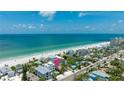 Aerial view of beach neighborhood with the property's proximity to the ocean highlighted at 722 Gulf Blvd, Indian Rocks Beach, FL 33785
