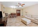 Open-concept living and dining area featuring neutral tones and ample space for entertaining or relaxing at 8436 60Th N St # 304, Pinellas Park, FL 33781