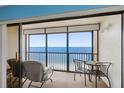Relaxing ocean view from the balcony, furnished with seating, perfect for enjoying the coastal breeze at 14950 Gulf Blvd # 905, Madeira Beach, FL 33708