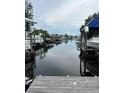 Scenic waterfront view showcasing boats and private docks along a calm canal at 802 White Heron Blvd, Ruskin, FL 33570