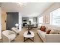 Bright and airy living room featuring stylish furniture, modern decor, and an open concept layout at 1820 Douglas Ave, Clearwater, FL 33755