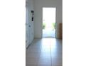 Bright entryway with tiled flooring at 36439 Garden Wall Way, Zephyrhills, FL 33541