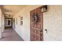 Inviting entryway with a decorative wreath and secure coded entry at 9700 Starkey Rd # 325, Seminole, FL 33777