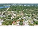 Neighborhood aerial view showing lush greenery and convenient access to the lake and community amenities at 11988 117Th St, Seminole, FL 33778