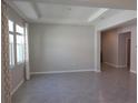 Open living room featuring ceramic tile flooring at 13111 Pepper Stem St, Spring Hill, FL 34609