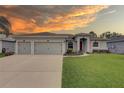Inviting single-Gathering home featuring a well-kept lawn and a convenient two-car garage at 3813 Salida Delsol Dr, Ruskin, FL 33573