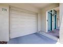 Spacious attached garage with access to the main entrance of the condo at 731 Cruise View Dr, Tampa, FL 33602