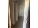 Hallway with access to multiple rooms at 7522 Needle Leaf Pl # 28, Tampa, FL 33617