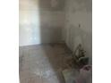 Open room that has been stripped down at 7522 Needle Leaf Pl # 28, Tampa, FL 33617
