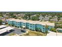 A corner view shows this charming building at 11447 Park Blvd # 205, Seminole, FL 33772