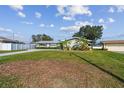 Charming single-story home with a well-maintained lawn, lush greenery, and a long driveway leading to the entrance at 1701 62Nd S Ter, St Petersburg, FL 33712