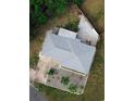 Birds eye view of the home, showcasing the new roof, backyard patio, landscaping, and neighborhood at 2444 35Th N St, St Petersburg, FL 33713