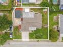 Aerial view of the property showing the entire perimeter and surrounding neighborhood at 3145 Domino Dr, Holiday, FL 34691