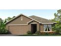 Attractive single-story home featuring a two-car garage, neutral paint and classic architectural details at 3511 Capital Reserve Dr, Plant City, FL 33565
