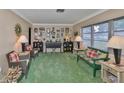 Cozy living room features bright windows, classic decor, and comfortable seating at 6401 15Th N St, St Petersburg, FL 33702