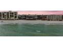 Beachfront condo building with stunning ocean views and white sand beach at 14900 Gulf Blvd # 308, Madeira Beach, FL 33708