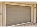 Attached one-car garage providing secure parking and storage space at 1604 Comfy Ct, Sun City Center, FL 33573