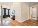 Elegant foyer with wood floors and plenty of natural light at 17566 Hyland Ln, Dade City, FL 33523