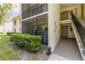 Charming condo with a private screened-in porch and convenient access to stairs at 3114 Lake Pine Way # G1, Tarpon Springs, FL 34688