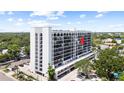 Stylish condo building surrounded by lush greenery offering a peaceful and scenic urban living experience at 3211 W Swann Avenue # 707, Tampa, FL 33609