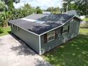 Home exterior with tidy landscaping, well-maintained siding, and a newly installed roof at 37045 North Ave, Dade City, FL 33523