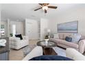 Inviting living room with neutral tones, plush seating, and stylish decor at 4706 Fox Hunt Dr, Tampa, FL 33624