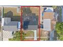 Aerial view of property with ample backyard space and a layout of surrounding neighborhood at 4803 Sierra Madre Dr, Tampa, FL 33634