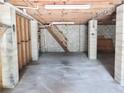 Unfinished basement featuring concrete floors and cinder block walls with exposed ceiling at 5736 116Th N Ave, Pinellas Park, FL 33782