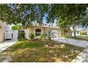 Lovely single-Gathering home with a well-maintained lawn, fresh plantings, and a two-car garage at 11627 Ivy Flower Loop, Riverview, FL 33578