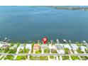 Single-Gathering home with easy access to a wide channel and the open bay from your private dock at 4823 Arlington Rd, Palmetto, FL 34221