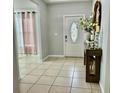 Welcoming foyer with decorative accents and tile flooring at 14015 Arbor Pines Dr, Riverview, FL 33579