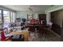 Bright dining area with a spacious table, ideal for entertaining guests at 18804 Tournament Trl, Tampa, FL 33647