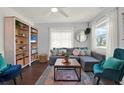 Comfortable living room with large sectional sofa, decorative pillows, and a modern rug at 3230 4Th S Ave, St Petersburg, FL 33712