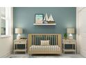Cozy Bedroom featuring a wooden crib, two side tables with lamps, and stylish decor at 7528 E 116Th St, Palmetto, FL 34221