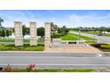 Pradera's neighborhood stone signage, water feature, and landscaping provide an inviting entrance at 11719 Tetrafin Dr, Riverview, FL 33579