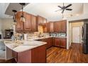 This is a well appointed kitchen with granite counter tops and stainless steel appliances at 12214 Buckingham Way, Spring Hill, FL 34609
