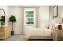 Serene bedroom with a fiddle leaf fig, soft textures, and natural light from a large window at 12313 Precious Ruby Way, Parrish, FL 34219