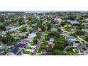 Scenic aerial view of a residential neighborhood with waterfront access at 1726 Massachusetts Ne Ave, St Petersburg, FL 33703