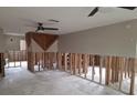 Renovated interior showing a work in progress with exposed framing at 1726 Massachusetts Ne Ave, St Petersburg, FL 33703