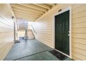 Inviting condo entrance with stairs to the upper level and front door number clearly displayed at 18533 Bridle Club Dr # 18533, Tampa, FL 33647