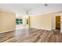 Spacious living room with modern floors, natural light, and an open layout for easy living at 18533 Bridle Club Dr # 18533, Tampa, FL 33647