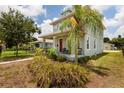 Charming two-story home with a cozy front porch and well-maintained landscaping at 4301 5Th N Ave, St Petersburg, FL 33713