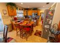 A traditionally styled kitchen featuring an island, stainless steel appliances, and tile flooring at 502 Dewolf Rd, Brandon, FL 33511