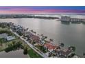 Panoramic aerial view showcasing waterfront homes, private docks, and expansive water views at 5287 61St S Ave, St Petersburg, FL 33715